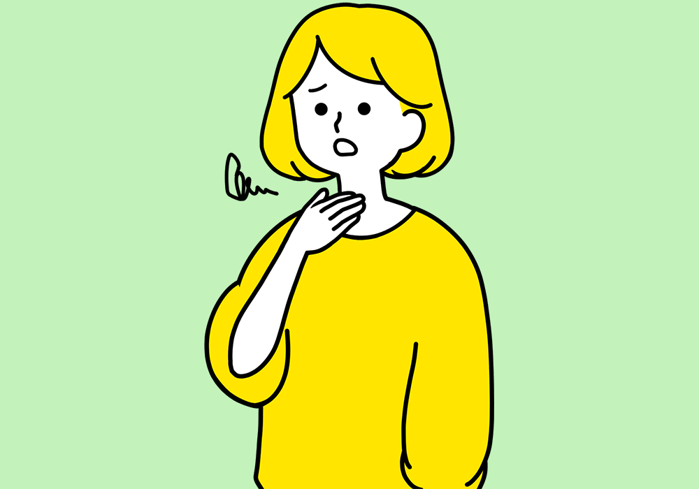 喉がイガイガする女性